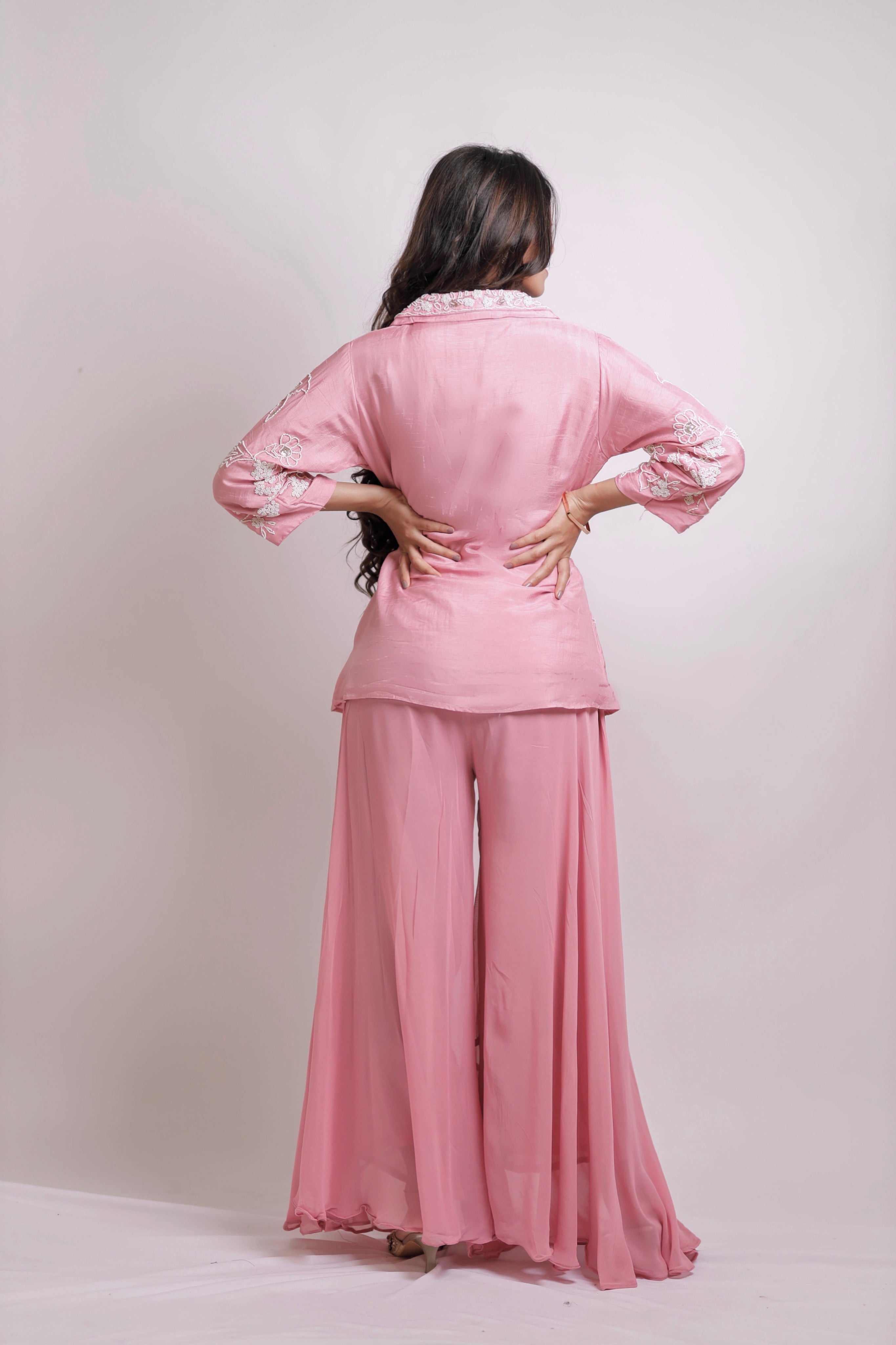 Blush pink handcrafted detailed shirt with brazillian pants.