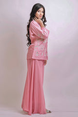 Blush pink handcrafted detailed shirt with brazillian pants.