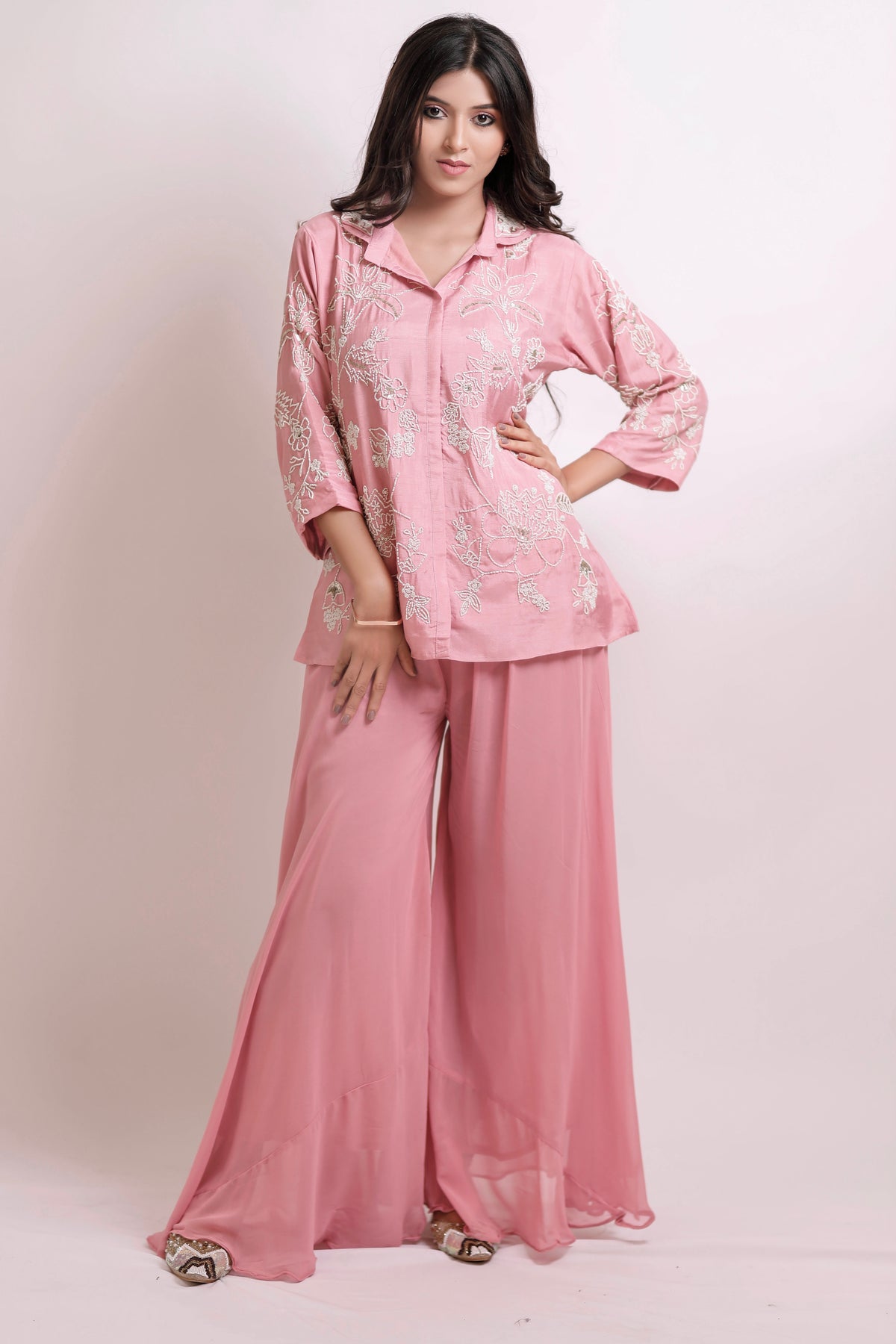 Blush pink handcrafted detailed shirt with brazillian pants.